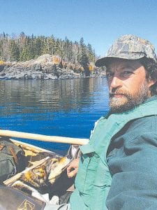 Photo by Erik Simula Erik Simula near Hovland on the first leg of his 1,000-mile canoe journey.