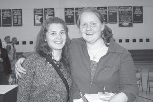 Staff photos/Rhonda Silence Dozens of scholarships and awards were presented at the Cook County High School 2009 Awards and Scholarship Program in the high school gym on Monday, May 18. Receiving the Scott Scholarship of $1,400 was salutatorian Leah Sobieck (left) and the Scott Scholarship recipient of $2,100 was valedictorian Leah Laky.