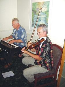 Left: Chris Gillis (left) and Max Bichel provide dinner jazz at the Pie Place Saturday, May 23 during the 2009 Grand Marais Jazz Festival.