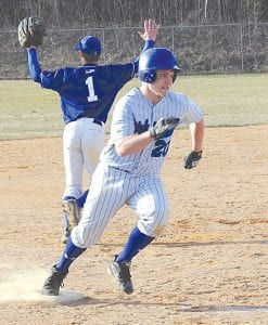 Photo by Bruce Johnson Jacob Rude rounds the bases in a recent home game. The Vikings are top seed going into the Section 7A playoffs with a record of 15-3.