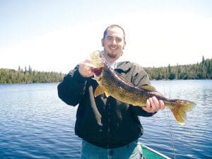 Photo courtesy of the family Jake Moritz of Grand Marais shows off the nice 26.5 inch walleye he caught at an area lake on Sunday, May 17. It weighed approximately 5 to 7 pounds.