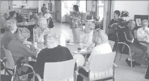 Photos by Kay Rosenthal A Volunteer Brunch was held at the North Shore Care Center on May 27 to honor volunteers. Hospital Administrator Diane Pearson addressed the volunteers who then enjoyed brunch and music performed by Nathan Baker.