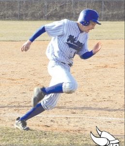 Photo by Bruce Johnson Drew Holmen, Viking No. 20, rounds third base in a recent home game. At press time, the Vikings were heading to Hibbing for the Section 7A semifinals.