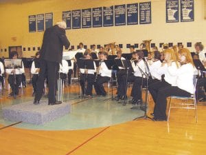 Far Left: John Redshaw gave his last performance with the Cook County Middle School Beginning Band and Seventh and Eighth grade Band Wednesday, May 20, 2009. He retired at the end of this school year. CCHS Senior High Band Director Bill Tormondsen recognized Redshaw during the concert for his many years of service and inspiration to Cook County students.