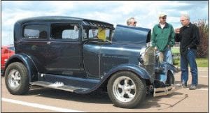 Above Left: Max Hinkle of Grand Marais entered this 1928 Ford Sedan, which received first place in Class F, Hot Rods & Customs.