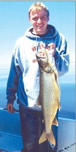 Photo courtesy of the family Eric Ford of Grand Marais with the 10 pound lake trout caught on Lake Superior on May 29.