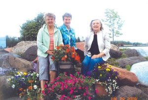 Co-chairpersons of this year's annual flower show are Grand Marais Garden Club members, from left, Donna Clothier, Margaret 