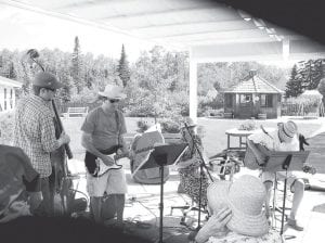 The North Shore Care Center kicked off summer by cooling off on the patio with some hot jazz, courtesy of Tuxedo Jazz Quartet which played while everyone sipped cold fruity beverages. The Care Center expressed thanks to musicians Liz Sivertson, John Gruber, Pete Cavanaugh, and Nathan Baker.