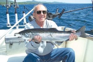 Andy Cerio of Charles City, Iowa, caught a beautiful steelhead while fishing with Captain Darren Peck of Tofte Charters on June 20. A beautiful day for being on Lake Superior!