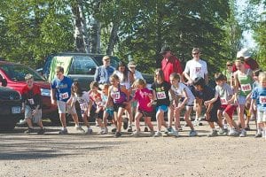 The 30th Tofte Trek 10K was one of the driest on record. It also had the largest field— 400 walkers and runners took part in the 4th of July event. Runners and walkers came from all over the state, nation and as far as the Czech Republic, and Ontario, Canada. There was also a great turnout for the kids' races (top).