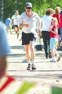 Braidy Powers of Grand Marais was the first walker across the finish line. He walked 10K in 1:07:06, a pace of 10:47/mile.