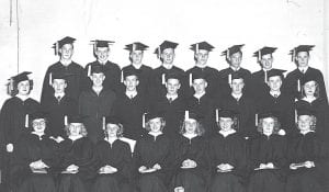 The Class of 1949 at their graduation ceremony, June 1949. (L-R, front) Anita Schultz, Carol Rude Berglund, Gertrude Allen Erickson, LaVerne Neudahl Bishop, Marie Hansen Morck, Nancy Dalbec, Pat Potter Holte, Doris Johnson Croft. (L-R, middle) Bev Denyes, Mike Bushman, Bill Berge, Duane 