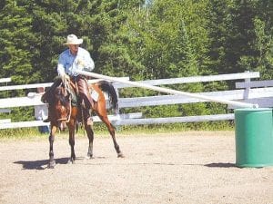 John Redshaw and his horse perform a maneuver in last year's Timex Three-Event Day trail class competition.