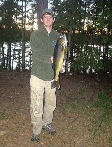 Brian O'Neill took a break from his job at Sawbill Canoe Outfitters for some fishing and had great luck! He is pictured here with the 28-inch walleye (almost 9 pounds) he caught at a 