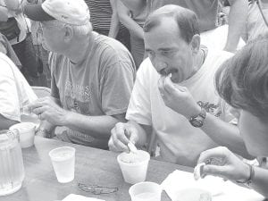 Above Left: For those who don't like pickled herring, watching the Sven & Ole's Pickled Herring Eating Contest may be painful. Contestants compete to see who can eat a halfpound of pickled herring!