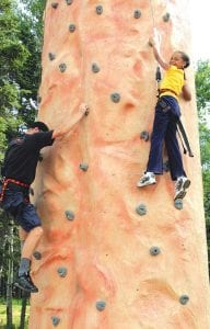 Molly Thomas, 9, from the island of St. Lucia in the West Indies, makes it look easy. If you think you can do better, consider entering the climbing wall competition at Golf 'N Stuff in Grand Marais. See if you can be the fastest to climb the 26-foot tall tower on Friday, July 31 at 5:00 p.m. For more information, stop by Grand Marais Golf 'n Stuff on Highway 61 or call (218) 387-3570.