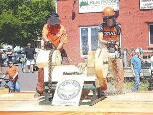 Lumberjacks—and Lumberjills, like Jenny Atkinson (right) will go head-to-head in an attempt to win a Husqvarna chainsaw.