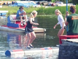 Photo courtesy of the family Jessica Berg-Collman of Grand Marais (left) in the Namekagon River Roll-Off in Hayward, Wisconsin on July 19, 2009. Jessica finished a very respectable sixth place in her first major tournament. She went on to be a medal winner in the Lumberjack World Championships in Hayward last weekend. She will be competing again at Lumber Camp in downtown Grand Marais during Fisherman's Picnic. Go Jess!