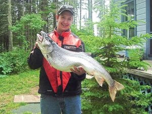 Photo by Misty Schliep Jory Schliep caught this huge lake trout when he was fishing on the Knott Enuff, Tim and Misty Schliep's boat. He was fishing with his sister, Mikala, and friend, Ashley Green. Everyone was cheering when he got this one in!