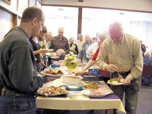 Photo courtesy of Grand Marais Lioness Club The Grand Marais Lioness Fundraiser, kicking off the Fisherman's Picnic celebration on July 29, included dinner, a silent auction and a bake sale, and grossed $4,000, which will be returned to the community in the form of donations. Dinners enjoyed a hearty meal of fishcakes and meatballs and lots more!