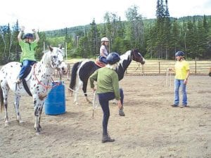 Photo courtesy of Cook County Fair Above: Simon Says….The 4-H Horse Club met recently at the new Cook County Fairgrounds Gunflint Horse Arena to learn some basic skills about horses with fun games like Simon Says and others. The 4-H Horse Club has six new volunteer 4-H horse leaders. Come and watch three days of horse show events during the Cook County Fair on August 21, 22 and 23!