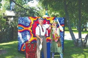 Staff photos/Andy Brostrom Below: Jugglers Cheney & Mills performed at the Grand Marais Library on Wednesday, July 8 entertaining a large crowd of kids and parents.