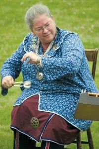 Above: Visitors to the Grand Portage National Monument were treated to music on the lawn in front of the Great Hall, including some lovely tunes that featured spoons.