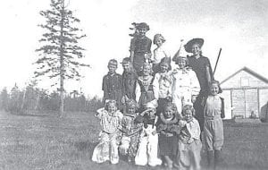 Cook County kids will be heading back to school soon—just like these children did in 1939. Marjorie Fay, one of those students, shares this picture of her classmates at the Flute Reed School in Hovland. (L-R, front) Mildred Potter, Jean Kjarum, Dennis Erickson, Marilyn Markin, Patsy Potter. (L-R, middle) Bill Kjarum, Roger Erickson, Valerie Nelson, Marie Sundquist, Mary Lou Hanson, Helen Sannes. (L-R, back) Gladys Berntson, Marjorie Sundquist, and Betty Hanson.