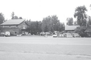 Staff photo/Hal Kettunen Even if his property is re-zoned as general commercial, Brad Thompson, of Thompson Performance , will have to remove the majority of the vehicles on his Grand Marais property.