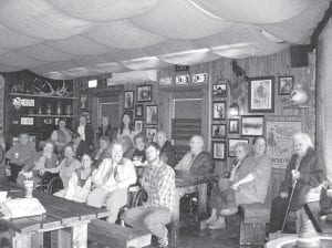 Photo courtesy North Shore Care Center North Shore Care Center residents were invited to be the first customers at Hughie's Taco House in April 2008. Owner Anna Hamilton treated them to taste the menu before her grand opening. The restaurant is named after her late father, a former resident at the Care Center, and features the Puff Taco. Inset: Hughie's Taco House owner Anna Hamilton.