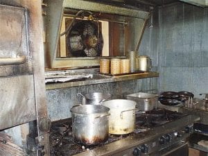 Photo courtesy of Cook County Law Enforcement Inset: The restaurant will need to replace its appliances—and a number of pots and pans.