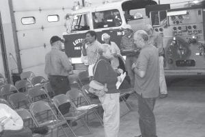 Staff photo/Rhonda Silence newspaper. Ads may The Lutsen Township August meeting, a continuation of the town's Annual Meeting in March, need to be decreased was held in the fire hall on Tuesday, August 18. After the meeting, some citizens lingered for slightly in size to fit further discussion of some of the agenda items.