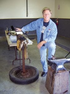 Staff photo/Jane Howard Artist/blacksmith Don Hammer displaying the tools of his trade at the county fair Saturday, August 22, 2009. He makes many of the tools he uses to create metal art.