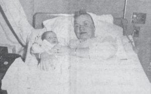 Right: Mrs. Fred Anderson and son, Alton Karl Anderson, first boy to be born at the North Shore Hospital.