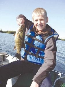 Robby Deziel from Lakeville, MN landed this 16'' smallmouth using a beaver flick lure and leech in four feet of water while fishing at an undisclosed lake with Joe Carlson of Joe's Inland Fishing.