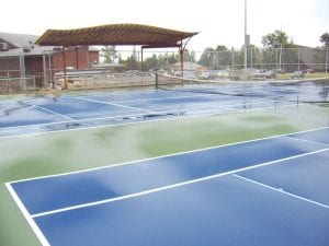 Staff photo/Jane Howard The new tennis courts and viewing area west of Cook County High School. The construction project, nearing completion, includes a new storage building and practice backboard. The public is invited to a celebration of the quarter-million-dollar project to be held Saturday, September 19, 2009 at the new courts. An opening ceremony will start at 11:00 a.m.