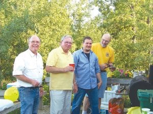 Photos by Sandra Hyne Above Right: The Grand Marais Lions Club steak fry 