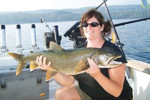 Photo by Darren Peck Suzanne Duckler of Edina caught and released this beautiful 16-pound lake trout while fishing with Captain Darren Peck of Tofte Charters on Saturday, September 12.