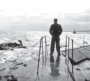 Photo courtesy of Minnesota Historical Society During the September 28 windstorm, Cook County residents were drawn to Lake Superior to watch the waves. That has always been the case, in rain or shine, as this photo from a 1950 collection demonstrates. This interesting view of the harbor was captured by Marv Kruskopf.