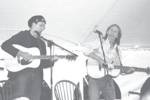 Staff photos/Laurie Johnson The eighth Unplugged: The Northern Harvest event once again brought the Big Tent to the North House Folk School campus on the Big Lake. Among many other activities was the Saturday, September 26 concert organized by Nashville songwriter Jon Vezner. Joining him on stage was Scottish singer-songwriter Dougie MacClean, Minnesota native Sally Barris (now living and performing in Nashville), 16-year-old guitarist Luke Enyeart, and local flutist Barb LaVigne.