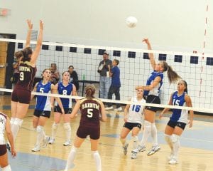 Photo by Bruce Johnson ~ BruceJohnsonphoto.com Vikings volleyball played an exciting five sets against the Barnum Bombers. Fighting hard on the court were (L-R) Ashley Deschampe, Kristina Rude, libero Samantha Jacobsen, Brea Boomer, and Christina Nelson.