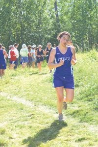 Left: On the girls’ varsity team, Michelle Weitz finished with her all-time best of 17:47. Above Left: David Bergstrom also had a big personal best, running 19:02. He also beat a number of runners who had finished ahead of him last week. Above Right: Freshman runner Kieran Scannell finished 27th in a huge field at the Milaca MegaMeet on Saturday, September 26, moving him to fifth on the all-time Vikings cross-country list.