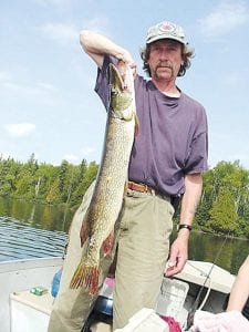 Photo by Joe Carlson Manford Viker of Rochester caught this 36-inch northern while fishing with Joe Carlson of Joe’s Inland Fishing. Look closely at the fish’s side—notice the yellow float rig. It’s “the one that got away” from another fisherman!