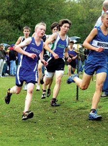 Left: Kieran Scannell conserved energy for a strong finish at Swain, completing the hilly course with a personal best of 17:17.