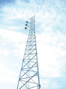 Photos courtesy of WTIP Top: As of Friday, October 9, 2009, the entire Grand Portage community can now tune in to WTIP community radio, thanks to a transmitter on this tower. Left: WTIP Engineer Jeff Nemitz coordinated the efforts to get WGPO up and running.