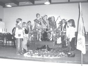 Cook County Girl Scouts kicked off the new year with an investiture ceremony Thursday, October 22, 2009 at the St. John’s Catholic Church fellowship hall. Left: These second-grade girls looked into a pond to find that they were the Brownies that could help others around them. From left: True Nies, Jaymie Kirk, Emma Gesch, Aurora Schelmeske, Robin Henrikson, Paige Everson, Ellen Callender, Bianca Zimmer, and Abby Crawford.