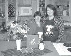 Deb Steenbakker of Grand Marais (left) and WDSE Cooks host Juli Kellner cooked up a batch of Steenbakker's Mexican Swizzle Sticks.