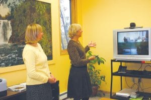 There are some sentimental features of the former First Baptist Church in the Cook County Higher Education North Shore campus and a lot of much needed technology. Higher Ed. Director Paula Sundet and Program Supervisor Kirsten Van den Berg demonstrate the ITV classroom.