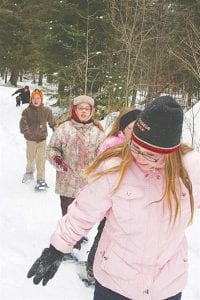 Sawtooth Mountain Elementary students enjoying snowshoeing.