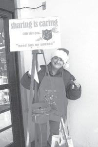 Cook County News-Herald publisher Deidre Kettunen was one of the many community members who took a turn at bell-ringing.